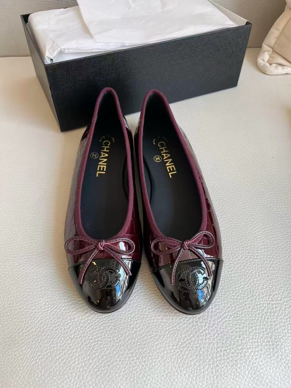 CHANEL Burgundy Patent Leather Cap-Toe Ballet Flats with Black Toes